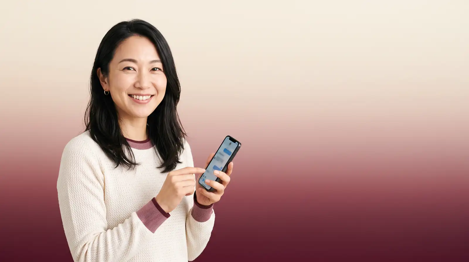 スマートフォンを持つ女性
